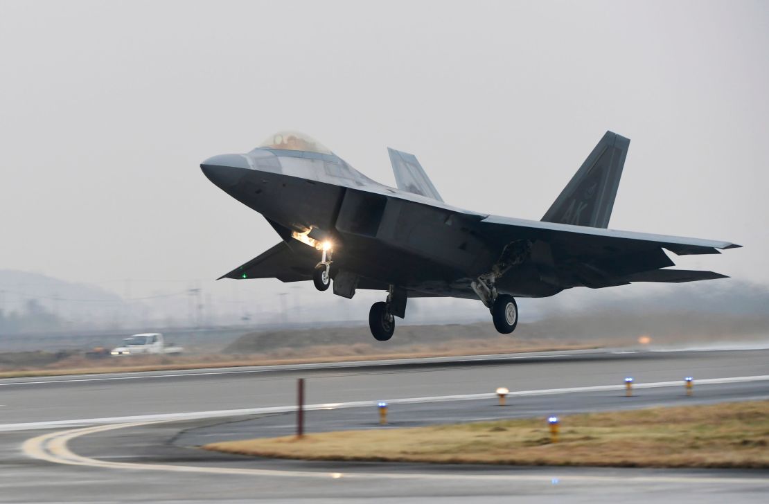 A US Air Force F-22 Raptor stealth jet takes off at a South Korean air base in Gwangju on December 4, 2017.