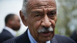 WASHINGTON, DC - APRIL 22:   U.S. Rep. John Conyers (D-MI) speaks to a reporter at the end of a news conference April 22, 2015 on Capitol Hill in Washington, DC. Rep. Conyers held the news conference to discuss the "End Racial Profiling Act."  (Photo by Alex Wong/Getty Images)