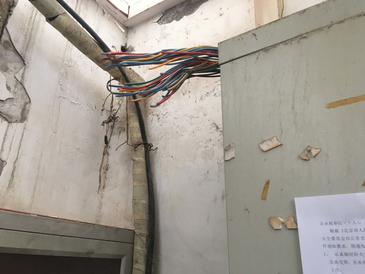 The electrical wires in a cleared building have been cut. According to the building's landlord, authorities cut the wires to ensure the residents being evicted will not move back in.