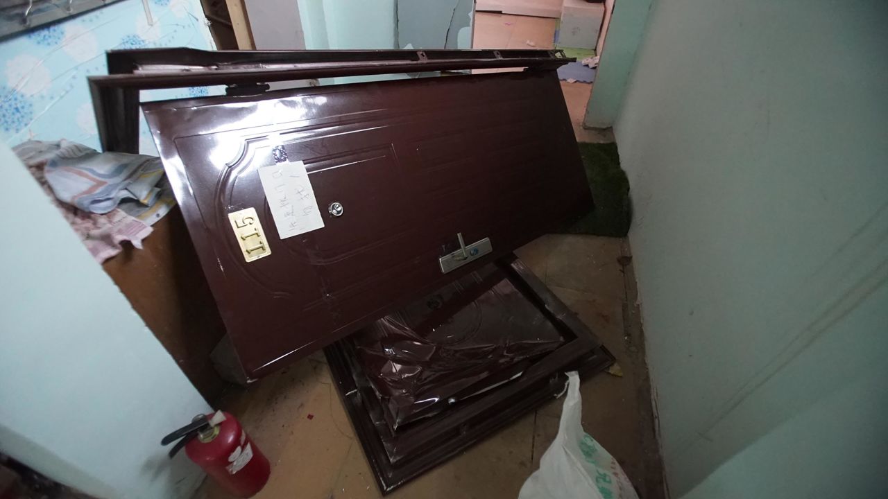 Doors to evicted apartments are left off their hinges to make the homes unlivable.