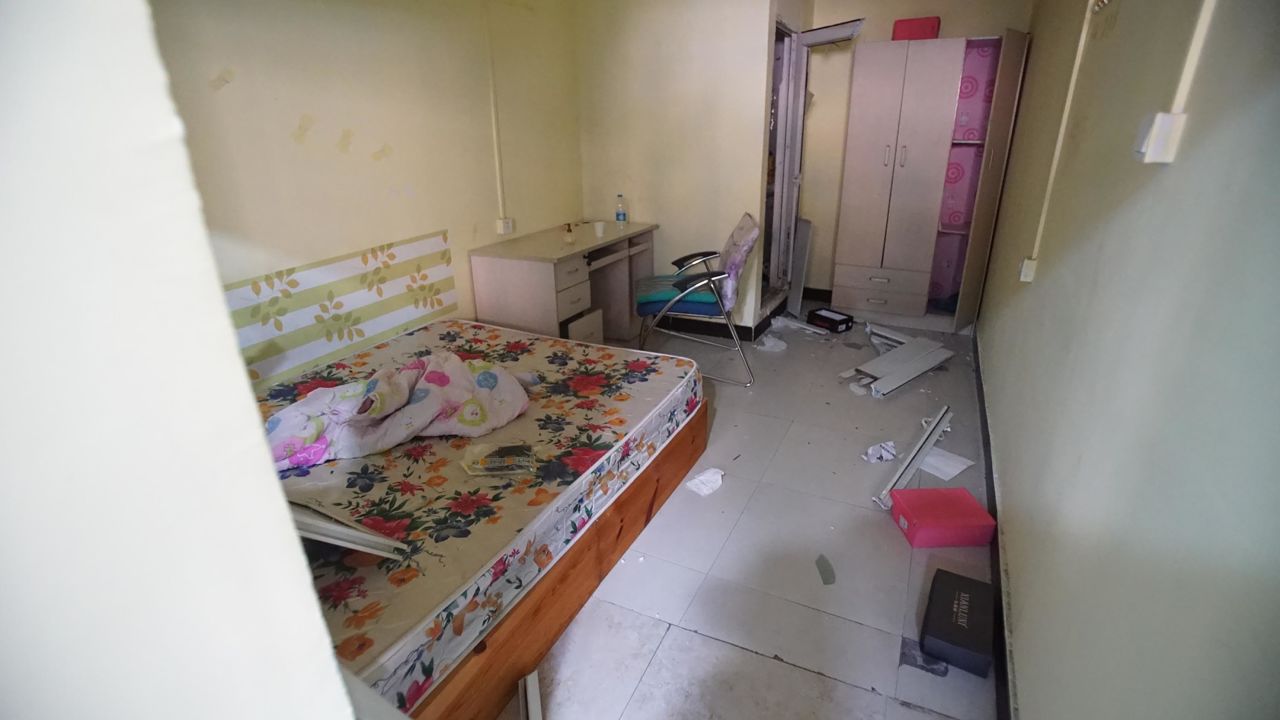 An evicted resident's belongings are seen scattered around a room. Some former tenants were given just a day's notice before being forced to leave.