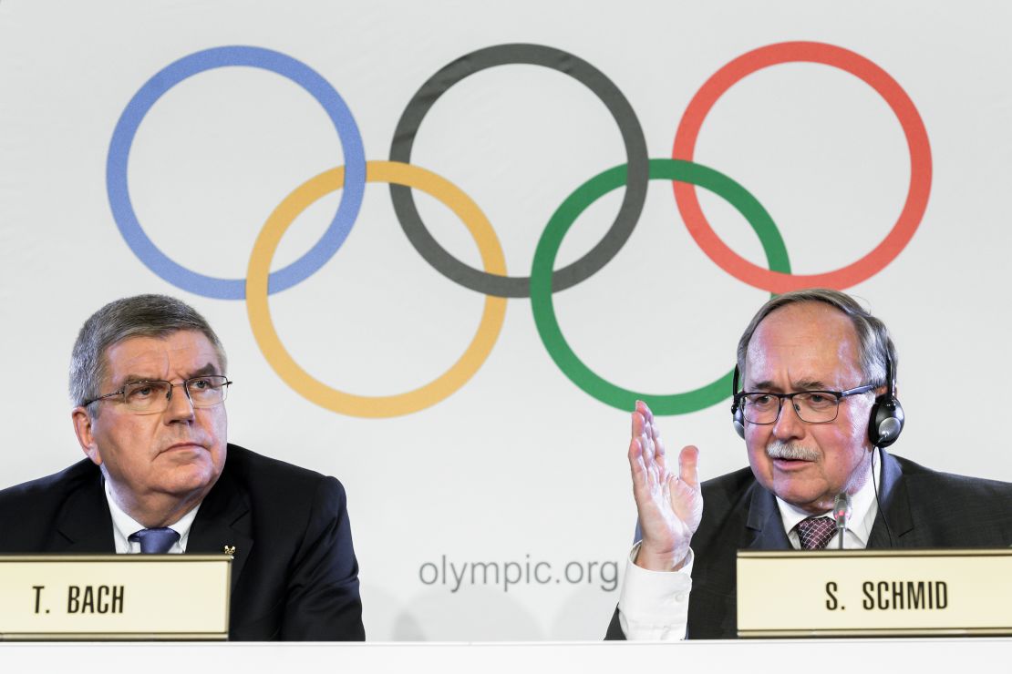 IOC President Thomas Bach (L) and Chairman of the IOC Inquiry Commission Samuel Schmid.