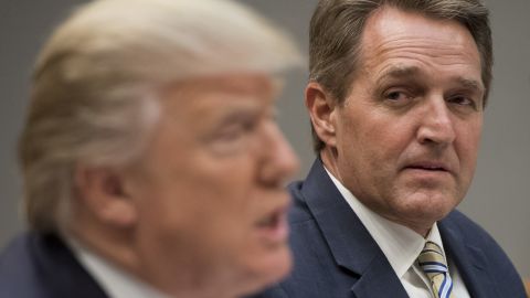 President Donald Trump speaks during a lunch meeting with Republican members of the Senate including Republican Sen. Jeff Flake of Arizona in the Roosevelt Room of the White House in Washington, DC, on December 5, 2017.