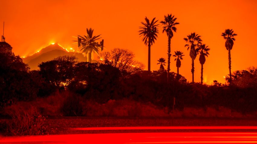 The Thomas Fire burns along a hillside near Santa Paula, California, on December 5, 2017.
More than a thousand firefighters were struggling to contain a wind-whipped brush fire in southern California on December 5 that has left at least one person dead, sent thousands fleeing, and was choking the area with thick black smoke. / AFP PHOTO / Kyle Grillot        (Photo credit should read KYLE GRILLOT/AFP/Getty Images)