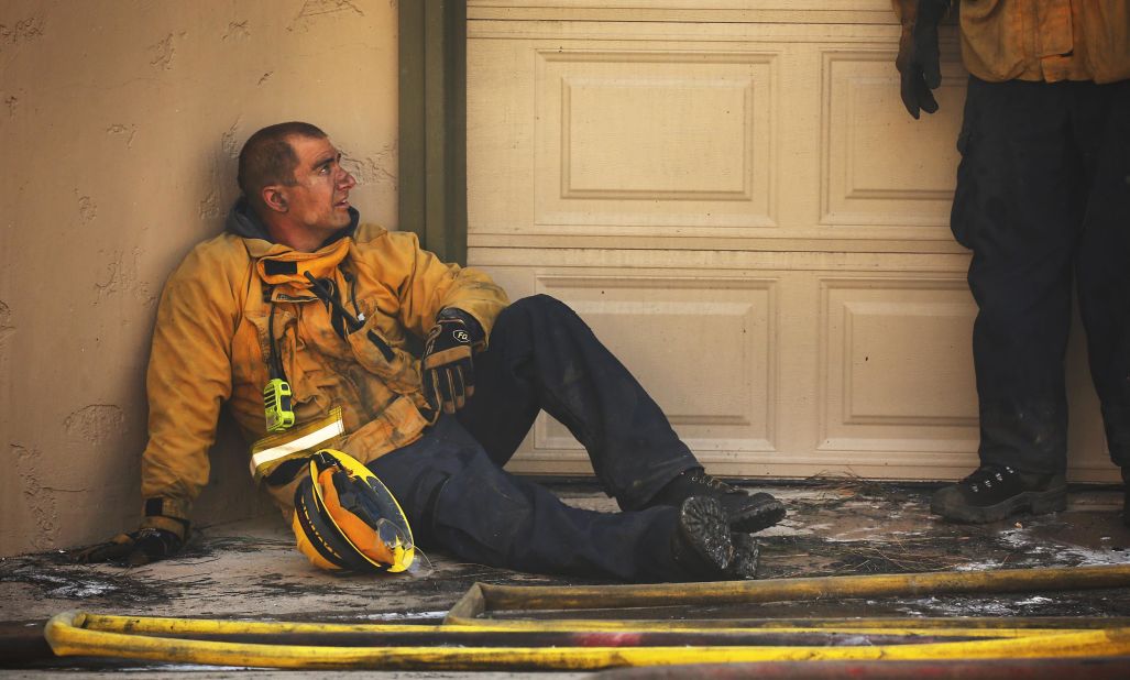 Ventura County firefighter Aaron Cohen rests on December 5.