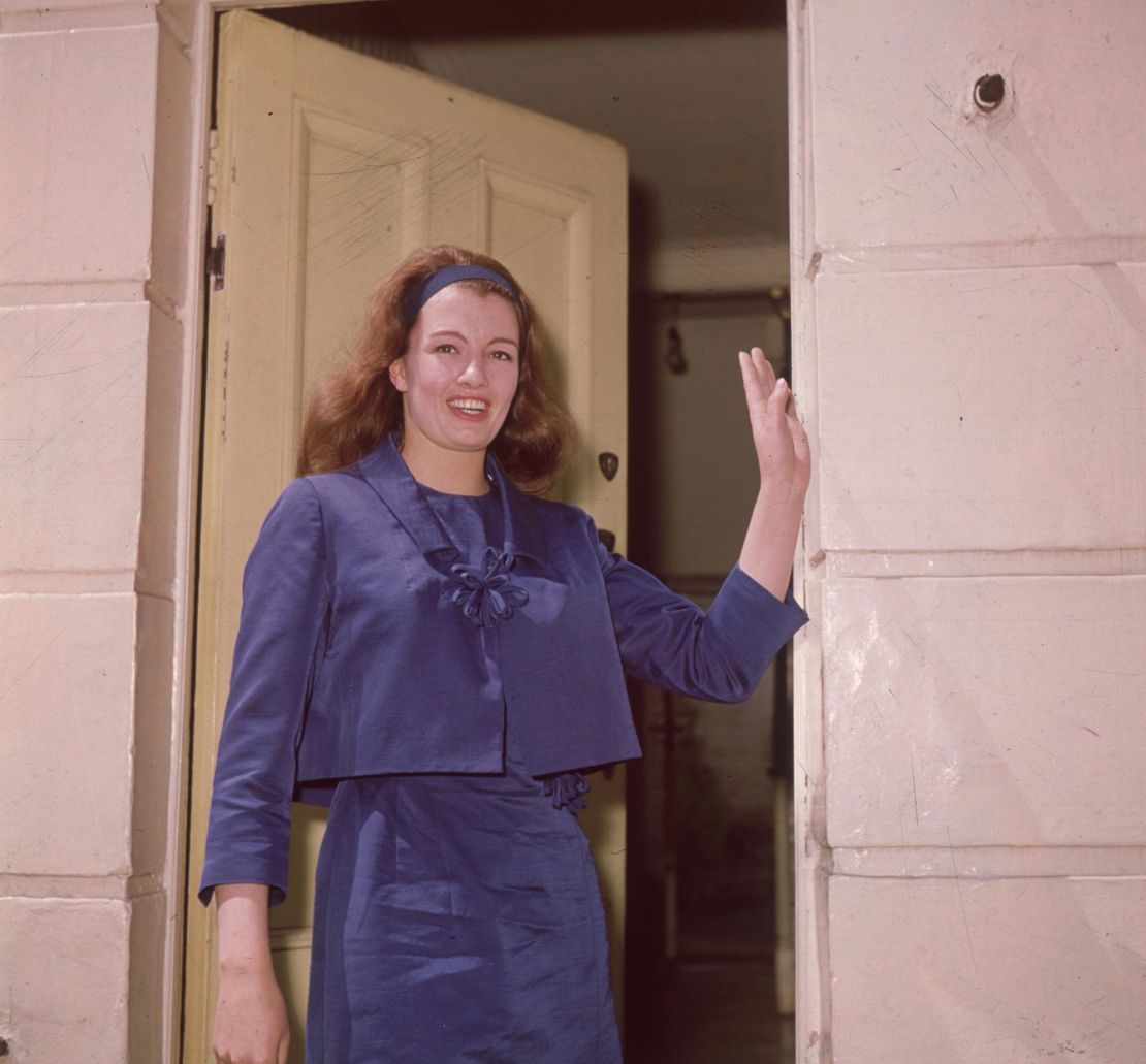 Christine Keeler stands outside her home in Linhope Street, north west London, shortly after her release from prison on June 9, 1964.