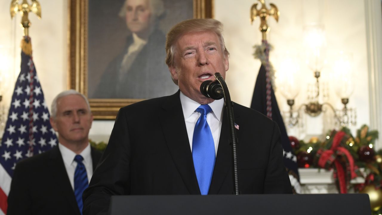 US President Donald Trump delivers a statement on Jerusalem from the Diplomatic Reception Room of the White House in Washington, DC on December 6, 2017 as US Vice President Mike Pence looks on. 