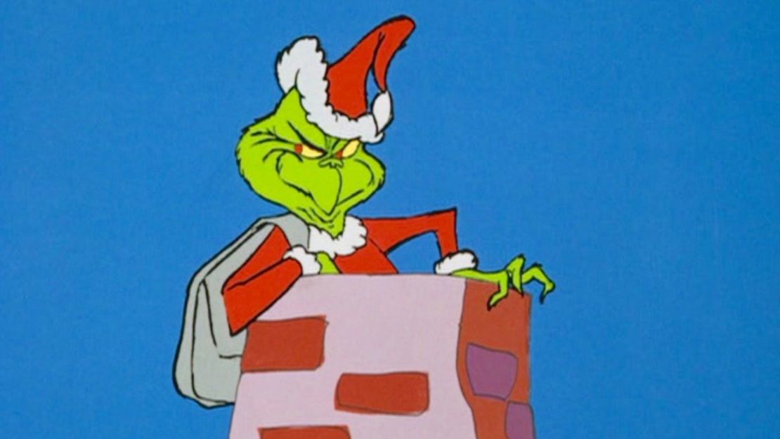 The Grinch prepares to slide down a chimney in the 1966 version of "How the Grinch Stole Christmas." 