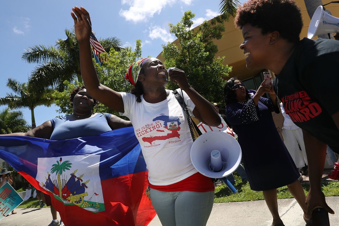 Earlier this year, Haitians marched to keep their protected status at an immigration office in Broward County, Florida.