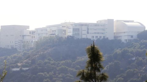 The Getty Center lies shrouded in smoke as seen from the Bel-Air district of Los Angeles after the Skirball Fire swept through on Wednesday.