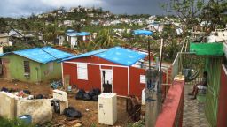 SAN ISIDRO, PUERTO RICO - OCTOBER 15:  Damaged homes, some covered with tarps provided by an NGO, stand in an area without electricity on October 15, 2017 in San Isidro, Puerto Rico. Puerto Rico is suffering shortages of food and water in many areas and only 15 percent of grid electricity has been restored. Puerto Rico experienced widespread damage including most of the electrical, gas and water grid as well as agriculture after Hurricane Maria, a category 4 hurricane, swept through.  