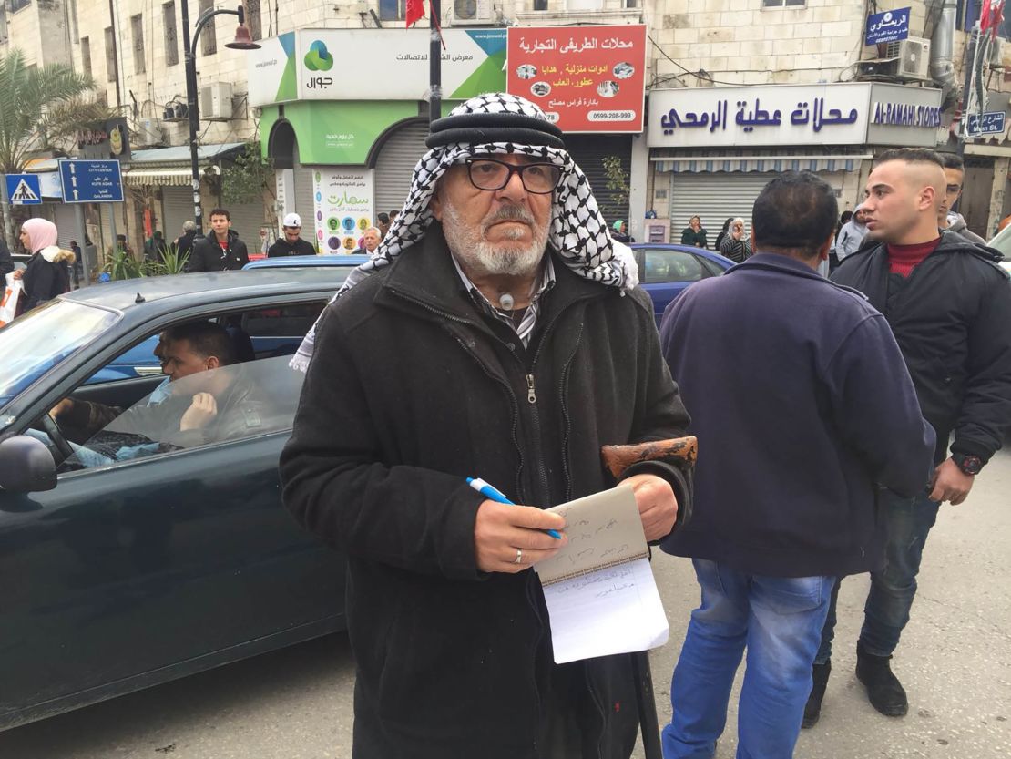 Naim Masarweh came to al-Manara square on Thursday to protest against Trump's announcement.