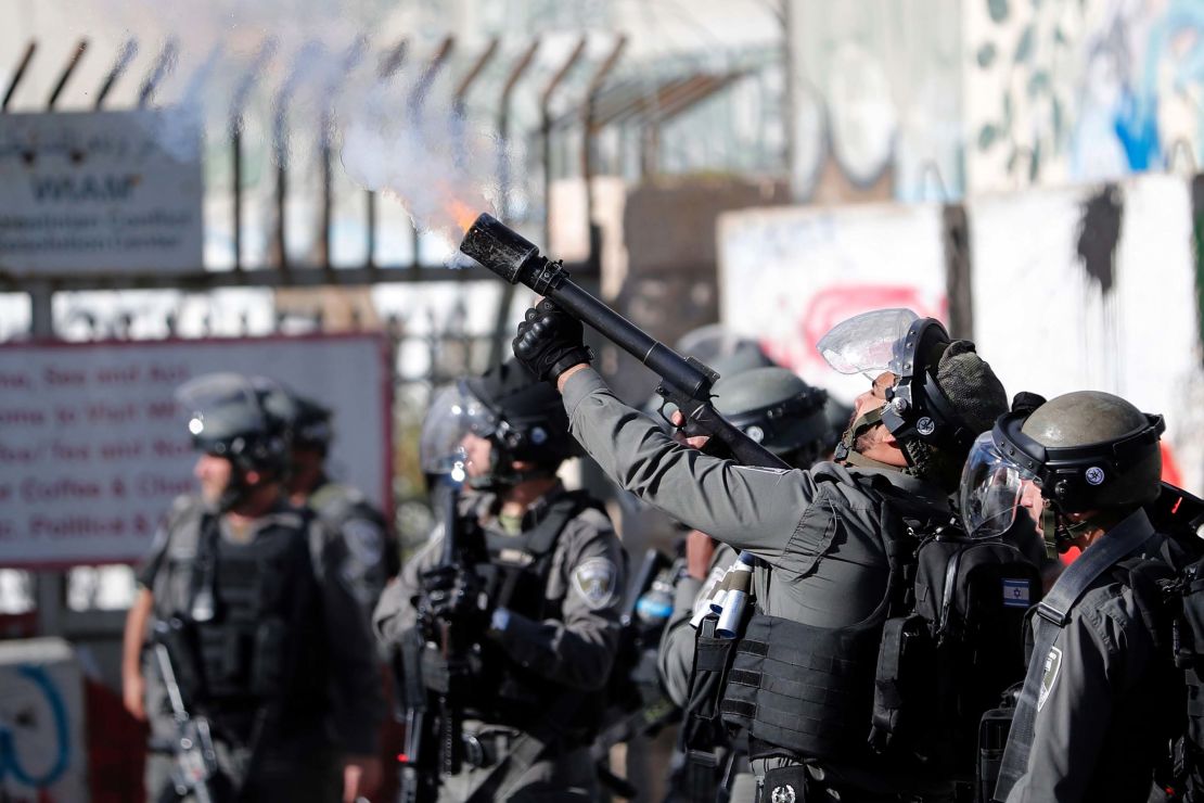 Israeli forces clash with Palestinian protesters near an Israeli checkpoint in Bethlehem on Thursday.