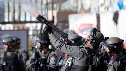 Israeli forces clash with Palestinian protesters near an Israeli checkpoint in Bethlehem on Thursday.