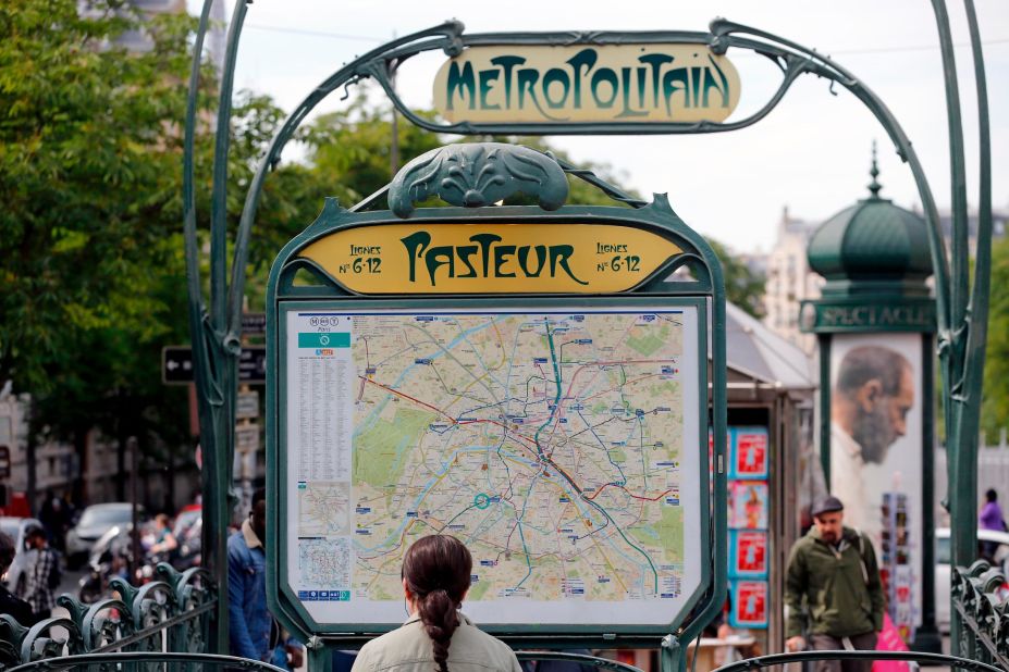 Hector Guimard's entrance to the Pasteur metro station in Paris, built in the early 20th century.