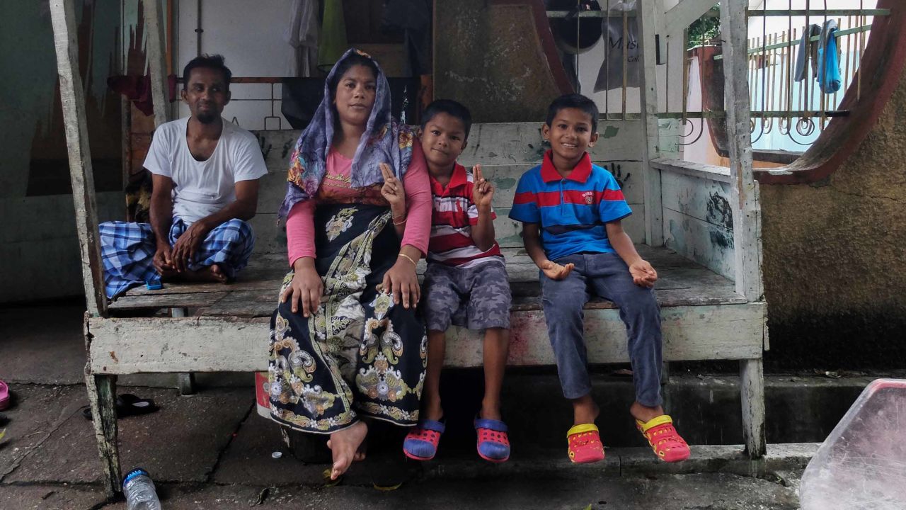Abdul Syukui, 40, sitting with his wife Hamidah Gonumia, 30, and younger sons Sabarek Khan Abdul, 8, and Nojumullah Abdul. 