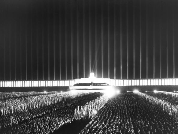 The "Cathedral of Light" was the name given to the practice of turning anti-aircraft searchlights to the sky en masse at the Zeppelin Field at Nuremberg. The visual spectacle was described as "<a href="index.php?page=&url=https%3A%2F%2Fbooks.google.co.uk%2Fbooks%3Fid%3DORGhCgAAQBAJ%26printsec%3Dfrontcover%26dq%3DMartin%2BKitchen%2C%2BSpeer%3A%2BHitler%2527s%2BArchitect%26hl%3Den%26sa%3DX%26ved%3D0ahUKEwjf-orgt_jXAhWGalAKHT4bBagQ6AEIKTAA%23v%3Donepage%26q%3DNevile%2520Henderson%26f%3Dfalse" target="_blank" target="_blank">both solemn and beautiful</a>" by British ambassador Nevile Henderson. Pictured is one such instance in September 1937.