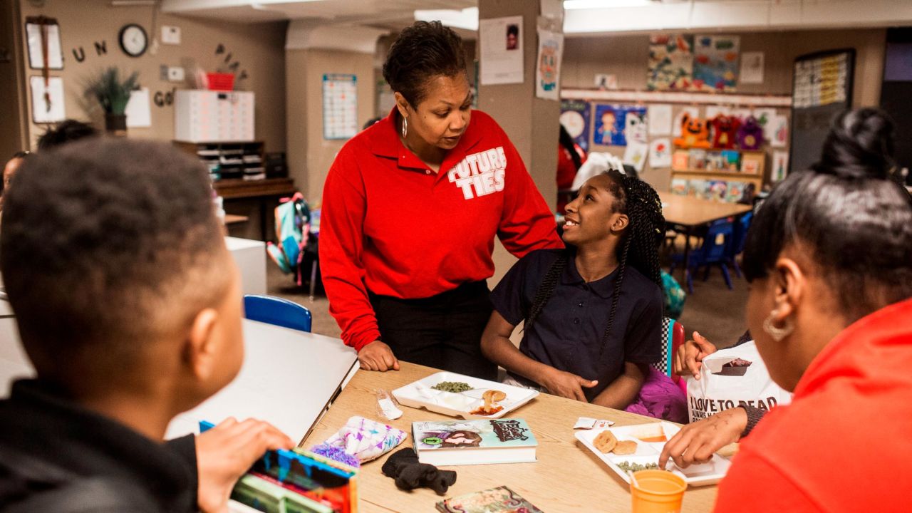 Future Ties mentors help program participants with their homework, provide hot meals and steer kids in a positive direction. The ultimate goal is to reach all 1,200 children who live in Parkway Gardens homes, an apartment complex on the South Side with a tough reputation. Maddox works a second job to support these efforts.
