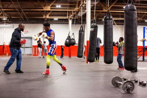 Sweeney has long had a passion for boxing, and he realized it could help young people develop discipline in other areas of life. What started as free lessons and mentoring, all paid out of his own pocket, is today a 27,000 square foot gym. It may look like a typical boxing gym at first glance, but the tutoring tables, computers and books give it away. Sweeney's motto is "Books before boxing."