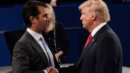 ST LOUIS, MO - OCTOBER 09:  Donald Trump, Jr. (L) greets his father Republican presidential nominee Donald Trump during the town hall debate at Washington University on October 9, 2016 in St Louis, Missouri. This is the second of three presidential debates scheduled prior to the November 8th election.  (Photo by Saul Loeb-Pool/Getty Images)