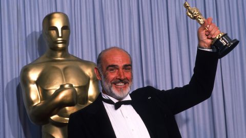 Connery holds up his Oscar for Best Actor in a Supporting Role for "The Untouchables" at the 1988 Academy Awards.
