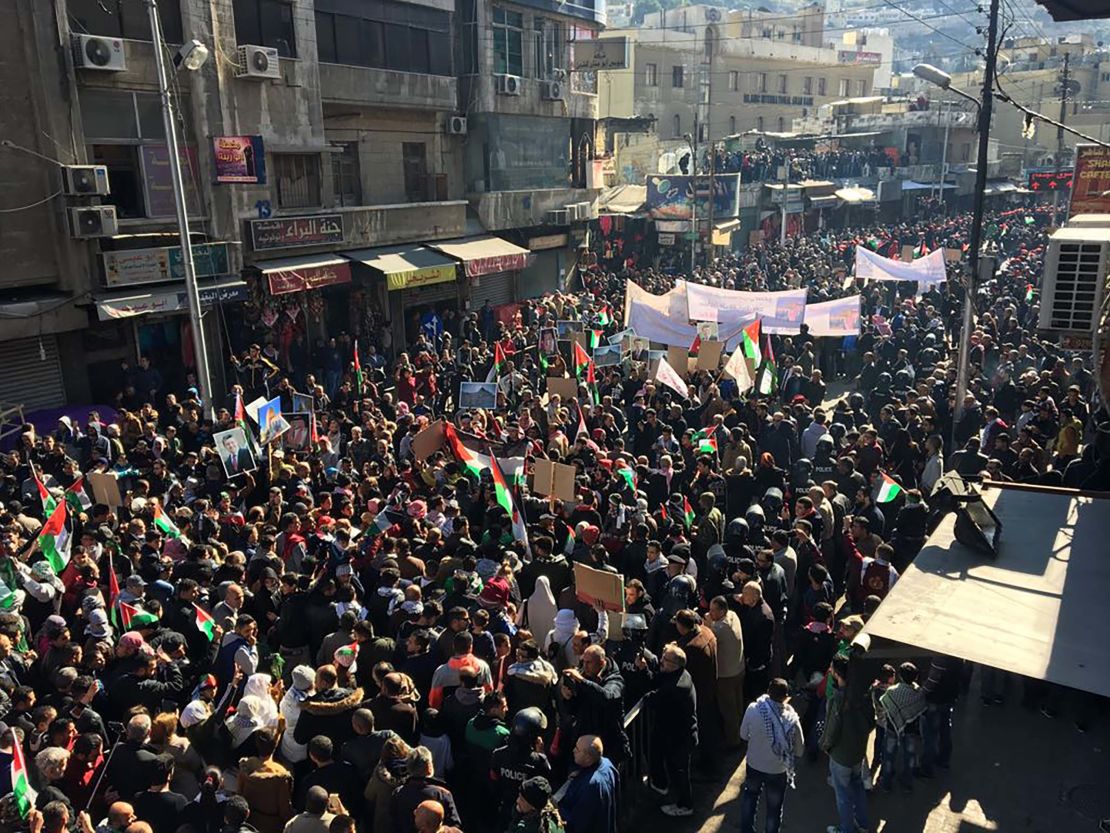 Protesters march through Amman, Jordan's capital, on Friday.