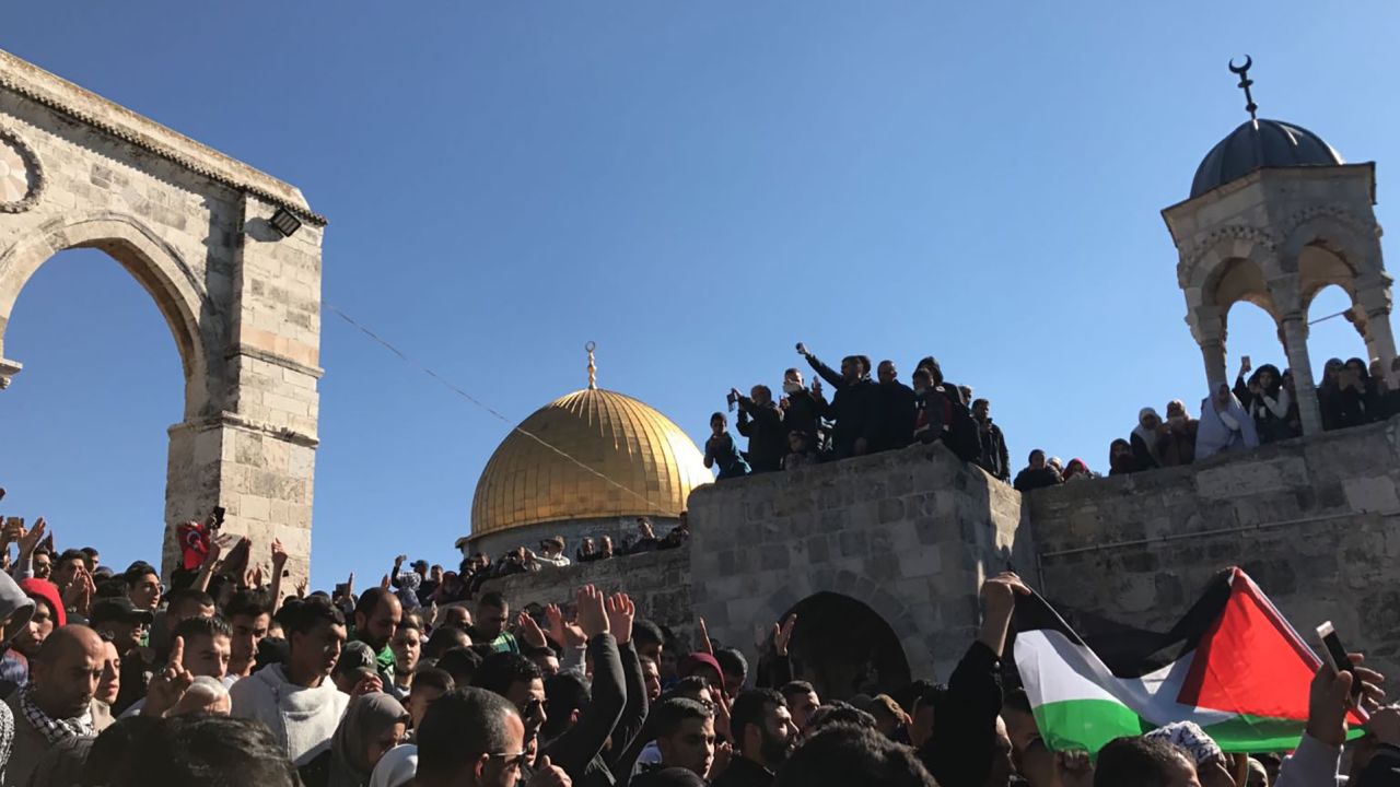 Demonstrators chant after Friday prayers at the al-Aqsa mosque in Jerusalem. 