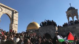 Demonstrators chant after Friday prayers at the al-Aqsa mosque in Jerusalem.