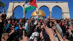 Palestinian Muslim worshippers shout slogans during Friday prayers in front of the Dome of the Rock mosque at the al-Aqsa mosque compound in the Jerusalem's Old City on December 8, 2017.