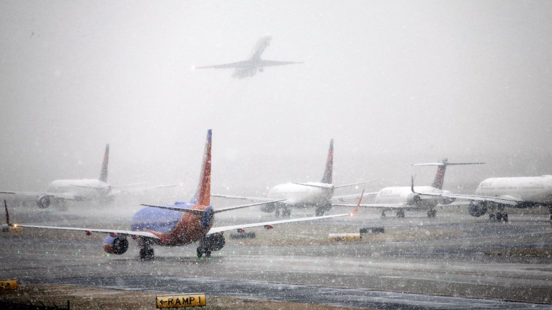 Snow delays travel Friday at Hartsfield-Jackson Atlanta International Airport.