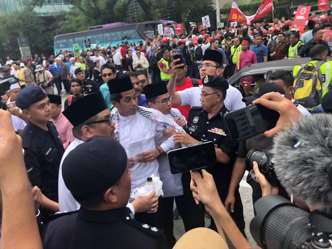 Protesters gather in Malaysia to denounce US President Donald Trump's decision on Jerusalem.