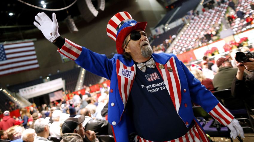 A supporter is seen before an rally for President Donald Trump in Pensacola, Fla., Friday, Dec. 8, 2017. (AP Photo/Jonathan Bachman)