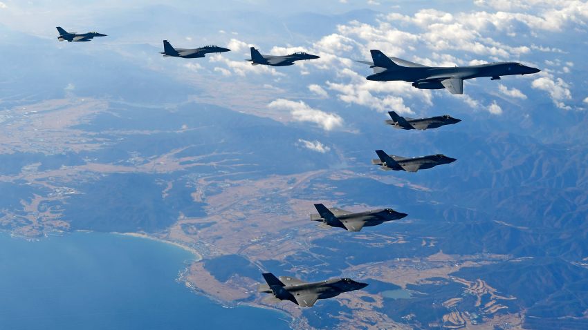 KOREAN PENINSULA, SOUTH KOREA - DECEMBER 06:  In this handout image provided by South Korean Defense Ministry, U.S. Air Force B-1B bomber (L), South Korea and U.S. fighter jets fly over the Korean Peninsula during the Vigilant air combat exercise (ACE) on December 6, 2017 in Korean Peninsula, South Korea. The largest-scale warplanes and military personnel take part in the annual joint exercise, which was scheduled before the North's latest missile test. North Korea fired a new intercontinental ballistic missile (ICBM) on November 29, believed to have shown capability to reach to the U.S. mainland.