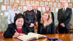 ICAN (International Campaign to Abolish Nuclear Weapons) campaigner and Hiroshima survivor, Setsuko Thurlow signs the Nobel protocol, during a press conference at the Norwegian Nobel Committee, in Oslo, Norway, Saturday, Dec. 9, 2017. As long as atomic bombs exist, a disaster is inevitable, the head of the International Campaign to Abolish Nuclear Weapons, the winner of this year's Nobel Peace Prize, said Saturday. 