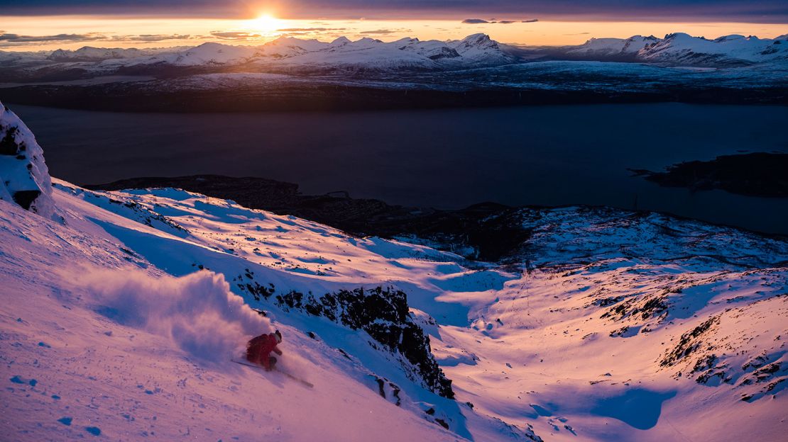 Micke af Ekenstam skis under the midnight sun above Narvik, Norway.