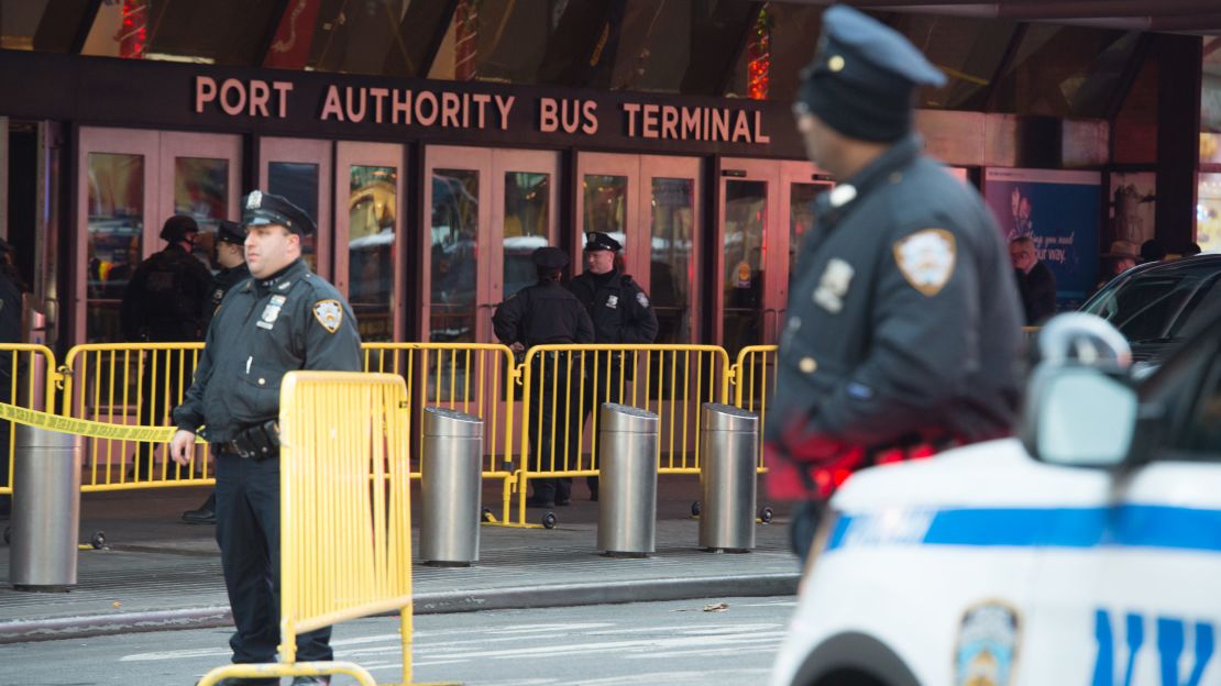 Police respond to an explosion at the Port Authority bus terminal on Monday in New York.