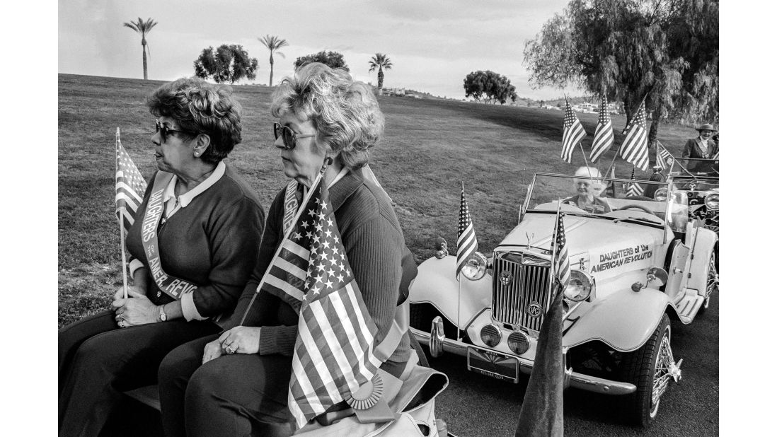 <strong>Patriotic moments: </strong>Hurn says politics seeped into his photographs more subtly than he expected. "You know, you do see a lot of flag waving -- and they have a lot of parades, they like parades," he says. <em>Pictured here: Fountain Hills Parade, 1979</em>