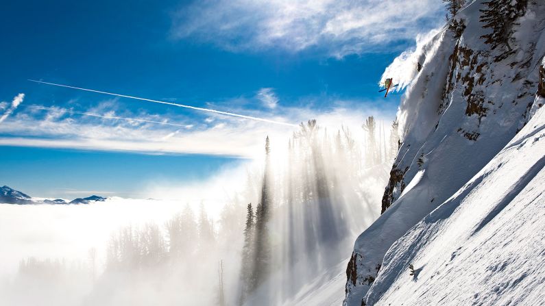 <strong>Ethereal light: </strong>"This is the late Jamie Pierre in Jackson Hole. Jamie held the unofficial world record for the highest cliff jump, but died in a snowboarding accident in 2011. This was probably the smallest cliff he jumped on this day. The fog coming through the trees was in and out and wasn't there when we set up for the shot. The second he dropped in it appeared and gave the shot a magical, mystical feeling. A minute or two later it had disappeared. Nature was on our side that day." -- <em>Oskar Enander.</em><br />
