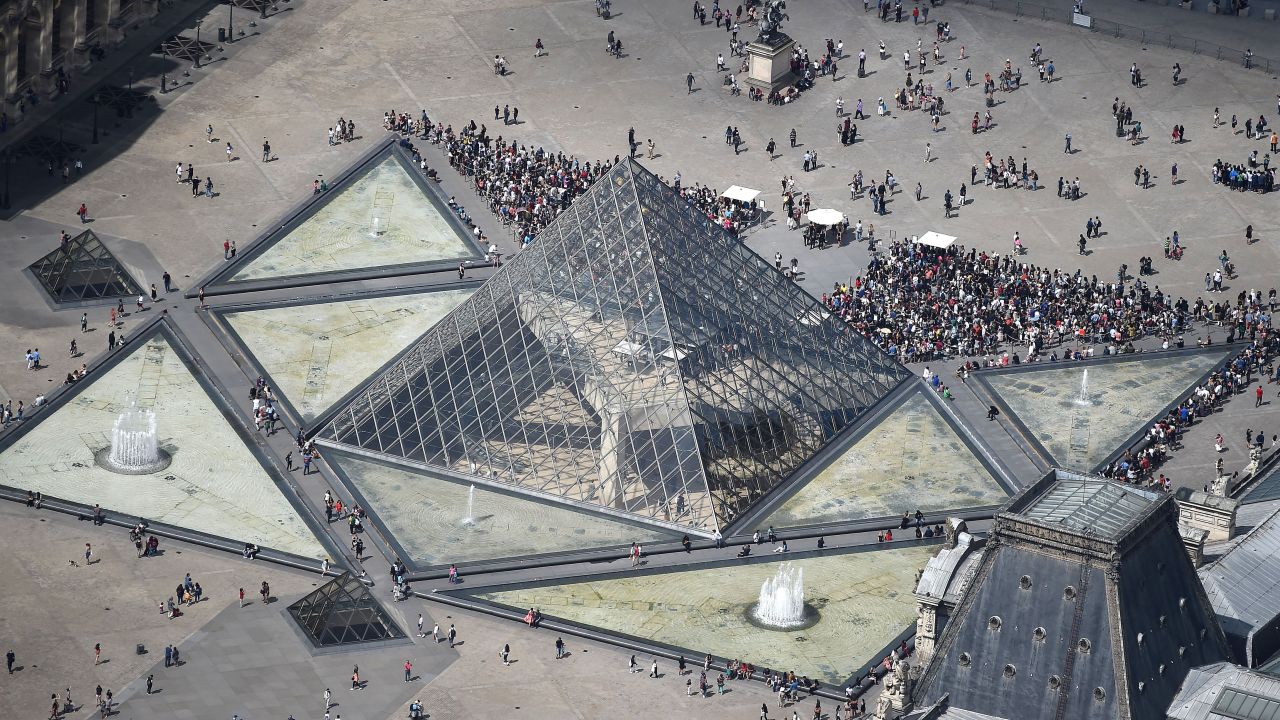 Made of glass segments and metal poles, I.M Pei's stunning pyramid serves as the public entrance to Paris's Louvre Museum. Situated in the Cour Napoléon, the main courtyard of the Louvre Palace, it is surrounded by three smaller pyramids. Since it opened to the public in 1989, the pyramid has become a much-loved Paris landmark. 
