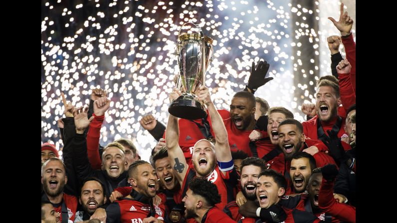 Toronto captain Michael Bradley hoists the MLS Cup after the soccer team won its first league title on Saturday, December 9. Toronto defeated Seattle 2-0 in what was a rematch of last year's final.