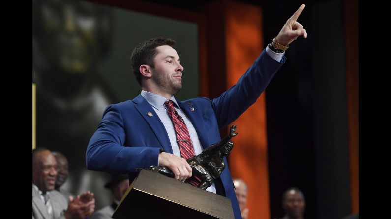 Oklahoma quarterback Baker Mayfield holds the Heisman Trophy after <a href="index.php?page=&url=http%3A%2F%2Fbleacherreport.com%2Farticles%2F2747686" target="_blank" target="_blank">winning the award</a> in New York on Saturday, December 9. The senior threw 41 touchdowns this year and ran for five as the Sooners won the Big 12 title and qualified for the College Football Playoff.