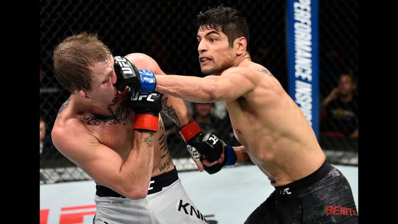 Gabriel Benitez punches Jason Knight during their UFC featherweight bout on Saturday, December 9. Benitez won by unanimous decision.