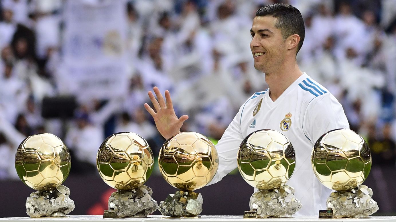 Real Madrid star Cristiano Ronaldo poses with his <a href="http://www.cnn.com/2017/12/08/football/cristiano-ronaldo-ballon-dor-lionel-messi-social-media/index.html" target="_blank">five Ballon d'Or trophies</a> before a Spanish league match against Sevilla on Saturday, December 9. Ronaldo now shares the record with Barcelona's Lionel Messi.