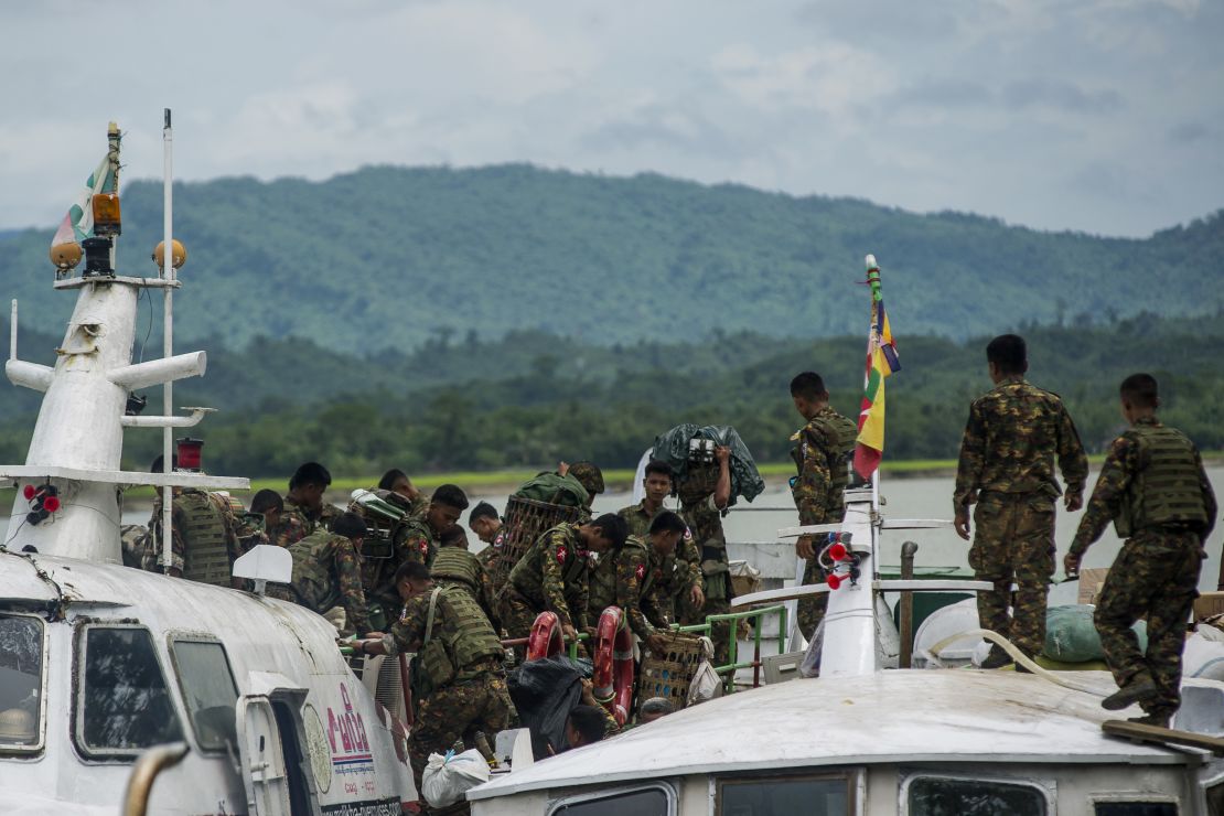 Myanmar soldiers arrive at Buthidaung jetty in Myanmar's Rakhine State on August 29, 2017.
