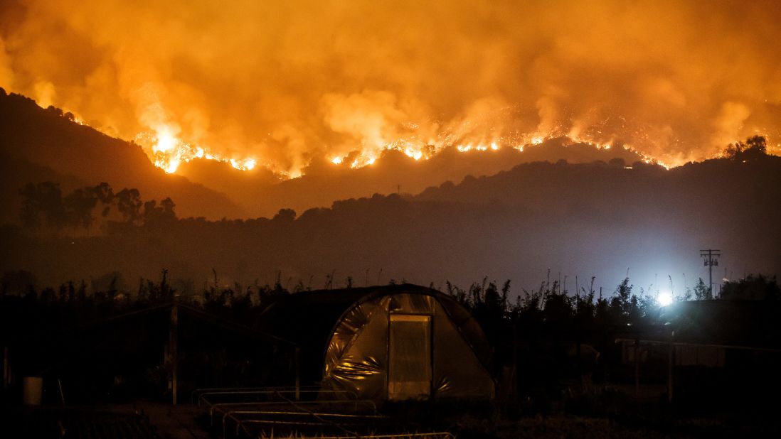 The Thomas Fire burns in the mountains near Carpinteria on Sunday, December 10.