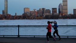 [CAMBRIDGE, MA - MARCH 5: Runners jog past an icy Charles River in Cambridge, Mass. on March 6, 2014.(Photo by Jessica Rinaldi/The Boston Globe via Getty Images)