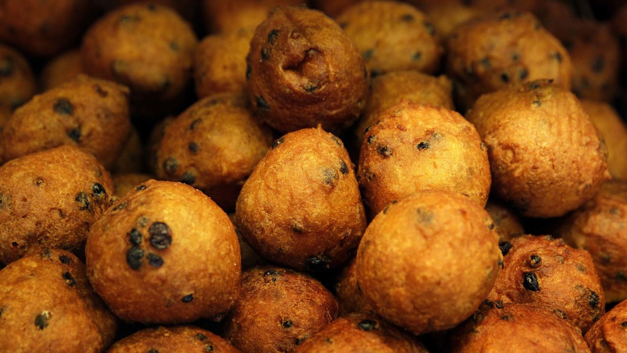 An oliebol is a doughnut-like product, traditionally made and consumed in the Netherlands during the New Year's celebrations.