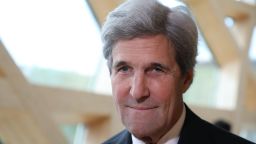 Former US secretary of state John Kerry smiles during the One Planet Summit on December 12, 2017 at La Seine Musicale venue on l'ile Seguin in Boulogne-Billancourt, west of Paris.  AFP PHOTO / LUDOVIC MARIN  