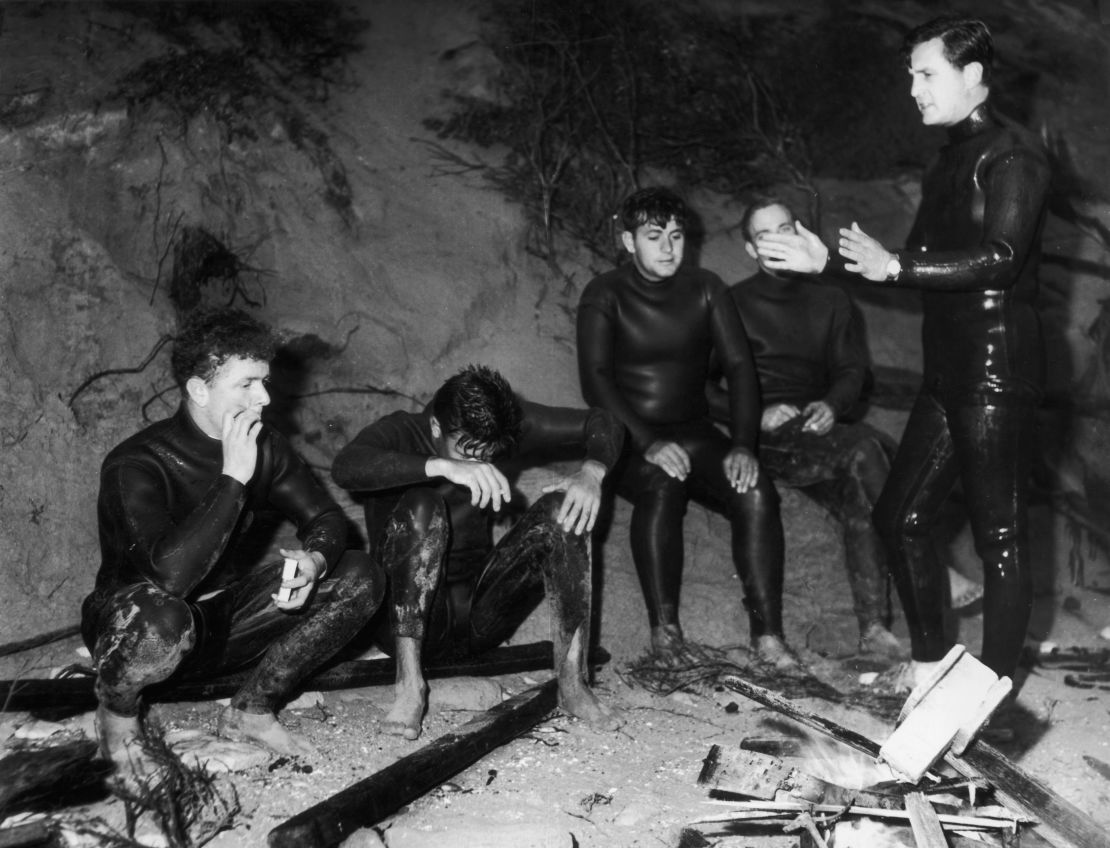 Divers take a break after unsuccesfully searching for the body of Australian Prime Minister Harold Holt.