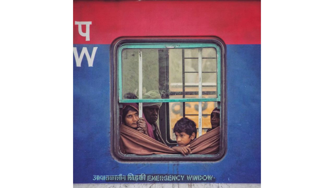 <strong>Inspiring others:</strong> Babar hopes his account will inspire others to take to the railways: "Lastly, if I can inspire people to stop Instagramming and actually travel, that would be real success," he says. "It's a funny paradox."<em> Pictured here: A boy looking out of the window,</em>